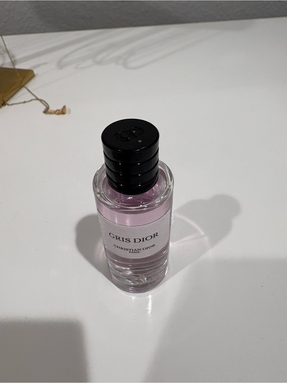 Tiny bottle of Gris Dior